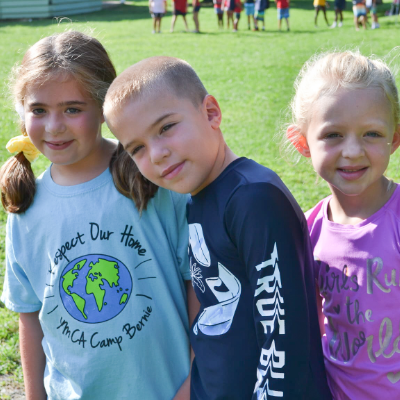 Three kids at camp